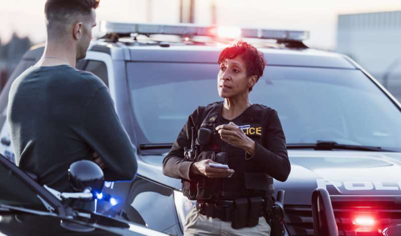 policewoman creating a police report after an accident in Charleston, SC