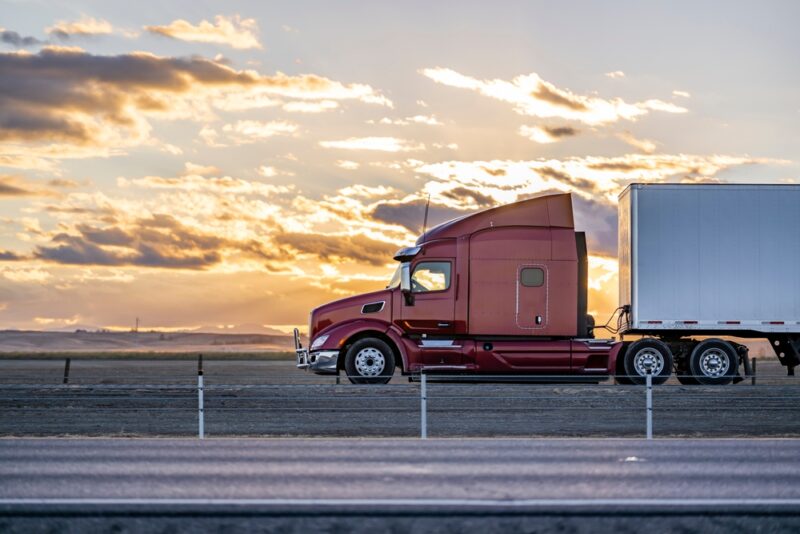 A large truck on the highway. You can work with a Georgetown truck accident lawyer after a crash.