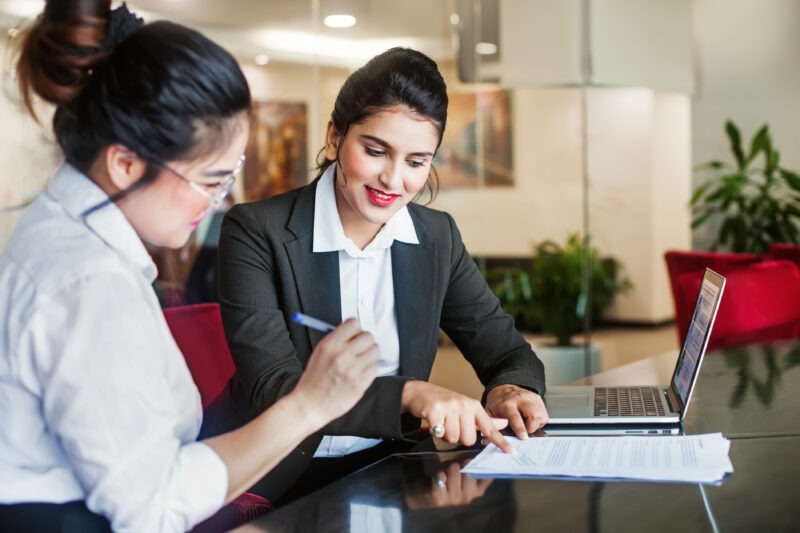 A personal injury victim signing her settlement agreement with her lawyer shortly after sending a demand letter.