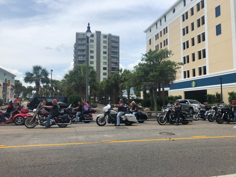 Bikers cruising Ocean Blvd. during Bike week fest.
